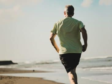 man running on seashore